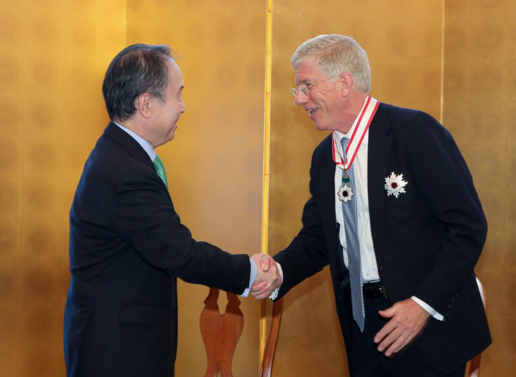 Centrus CEO Daniel Poneman and Ambassador of Japan to the United States Koji Tomita shake hands during the Order of the Rising Sun conferment ceremony.