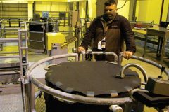 Centrus employee assesses readiness of centrifuge assembly stand